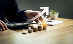 interest rates and dividends, Business people calculate and higher graphs and percentages investment returns, stock return income, retirement Compensation fund, investment, dividend tax