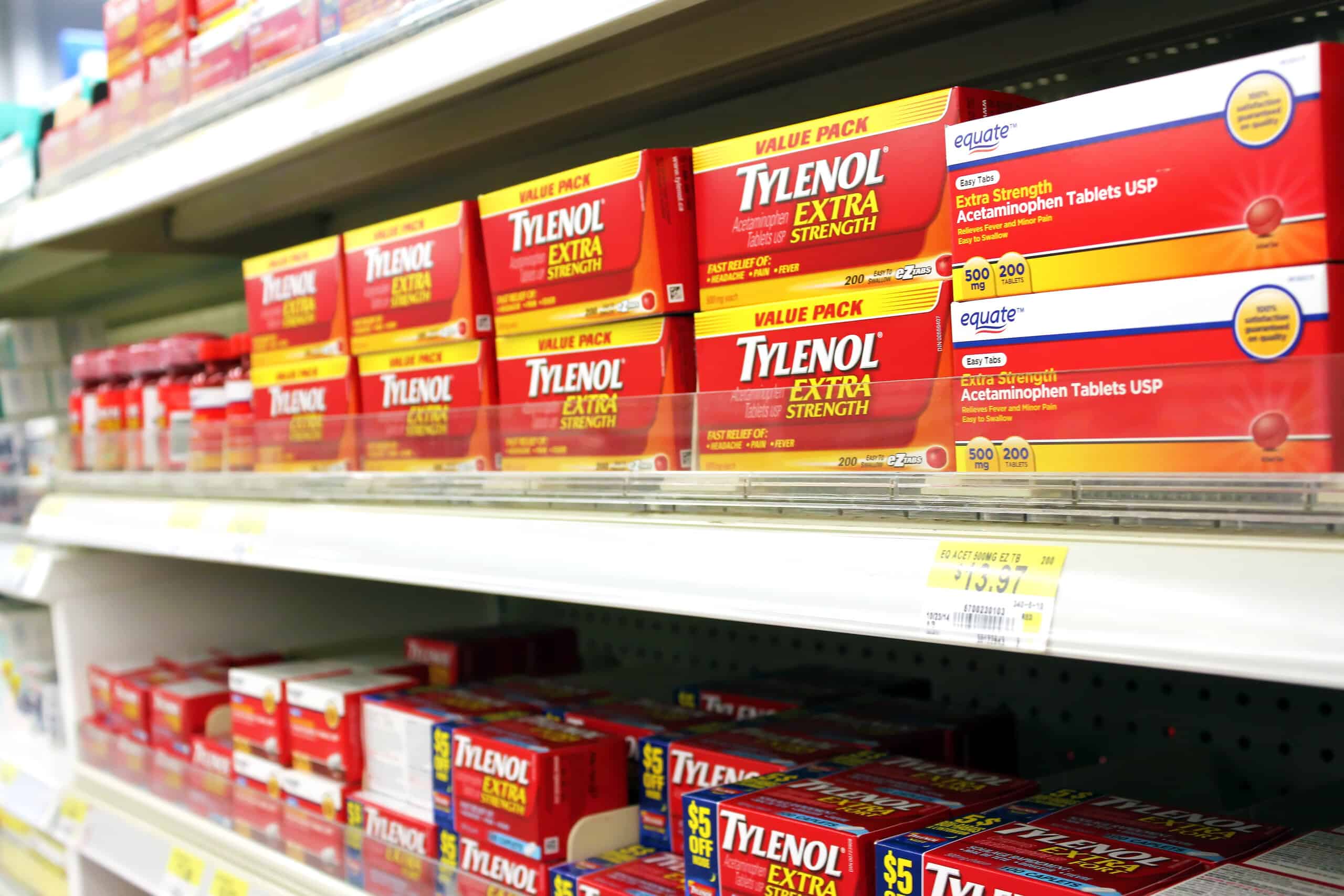 Bottles of Tylenol displayed on store shelves.