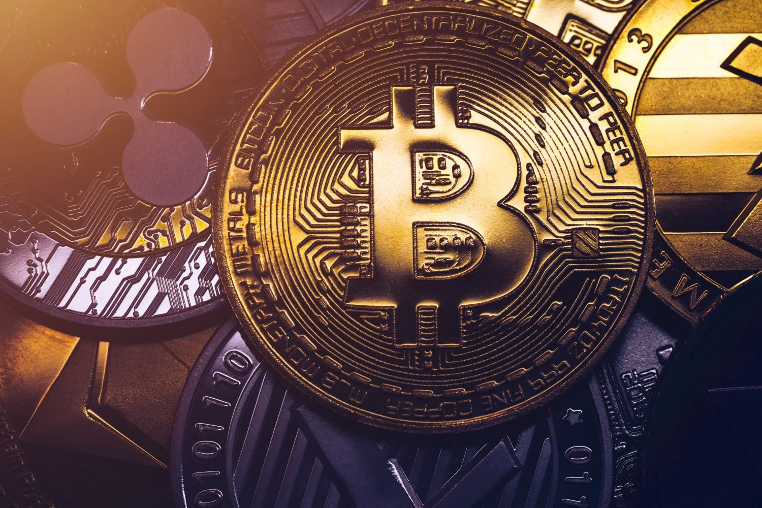 Crypto currency coin set collection, bitcoin, ethereum, litecoin, ripple. Digital currency. Cryptocurrency. Silver and golden coins with bitcoin, ripple, litecoin and ethereum symbol.