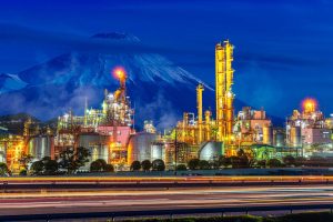 Oil refinery factory in Japan with Fuji mountain background on Night time