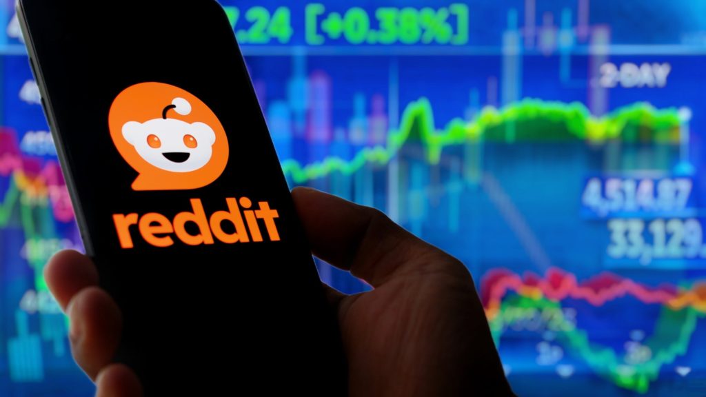 Reddit Logo (RDDT) In Front of Stock Chart