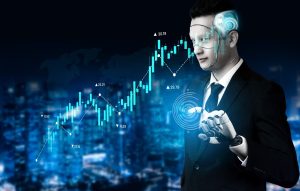 A digital artwork showing a human-like robot in a dark suit with glowing blue digital features on its face and a robotic hand. The robot's hand interacts with a luminous blue circular interface, while a fluctuating blue stock market graph with numerical data floats in the background over a blurred dark blue city skyline with a faint world map.