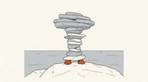 Ink illustration: a tall, top-heavy cairn of gray stones on a shoreline rock, resting on two small orange stones at its base.
