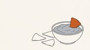 Illustration: an orange tortilla chip dipped into a bowl of dip, a few more chips beside it