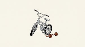 Illustration: a child's bicycle stands with its orange training wheels removed and lying beside it