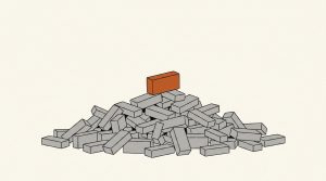 Illustration: a single orange brick sits on top of a large heap of gray bricks