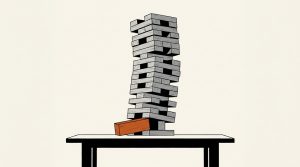 Illustration: a leaning tower of gray wooden blocks with one orange block pulled out from its base