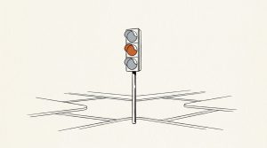 Illustration: a gray traffic light at an empty crossing with only the middle orange light lit