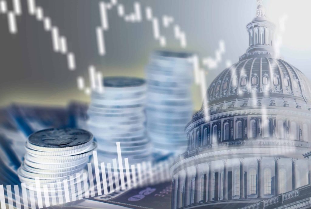 A composite image with an ethereal blue and white overlay, showing stacks of silver coins and various financial bar charts and line graphs. The dome of the U.S. Capitol building is visible on the right, partially translucent, representing the connection between government and financial markets.